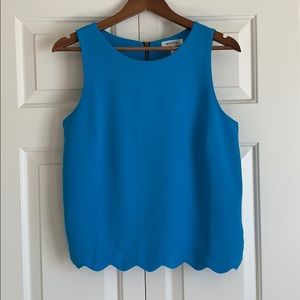 Light blue tank with scalloped bottom